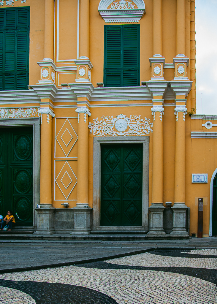 Close up of a green door at the front of the St. Dominic's Church.